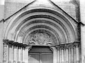 Til-Châtel : Eglise Saint-Florent - Tympan et voussure du portail
