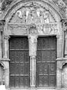 Saint-Thibault : Eglise - Portail de la façade nord : tympan et porte