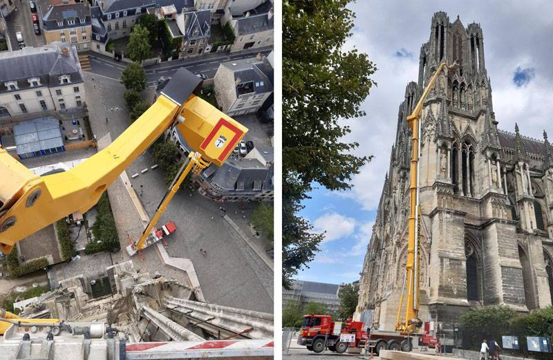Cathédrale de Reims - Vue du haut de la nacelle et pose de nouveaux filets sur la baie d'abat-sons