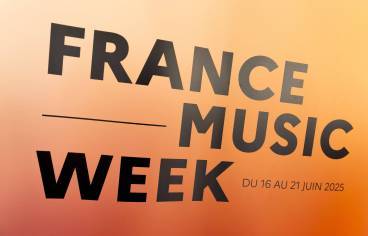 panneau avec inscription France music week, en noir sur fond orange