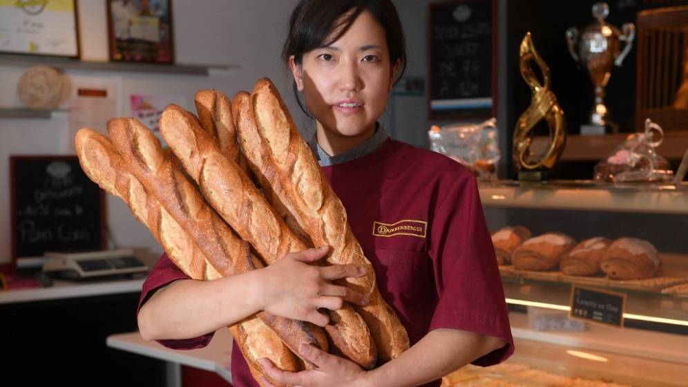 BAGUETTE-PAIN-PATRIMOJNE-IMMATERIEL-UNESCO-PATRICK-HERTZOG-AFP.jpg