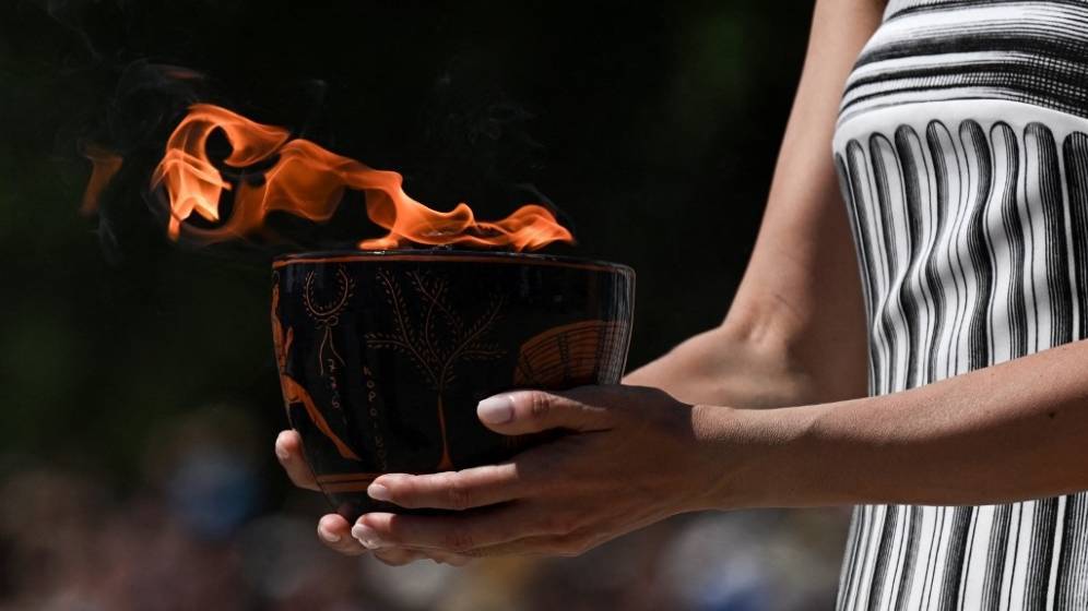 FLAMME-OLYMPIQUE-ARIS-MESSINIS-AFP.jpg