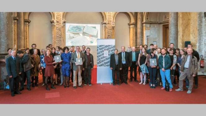 Trésors des bibliothèques et archives d'Alsace - l'éditrice entourée des auteurs